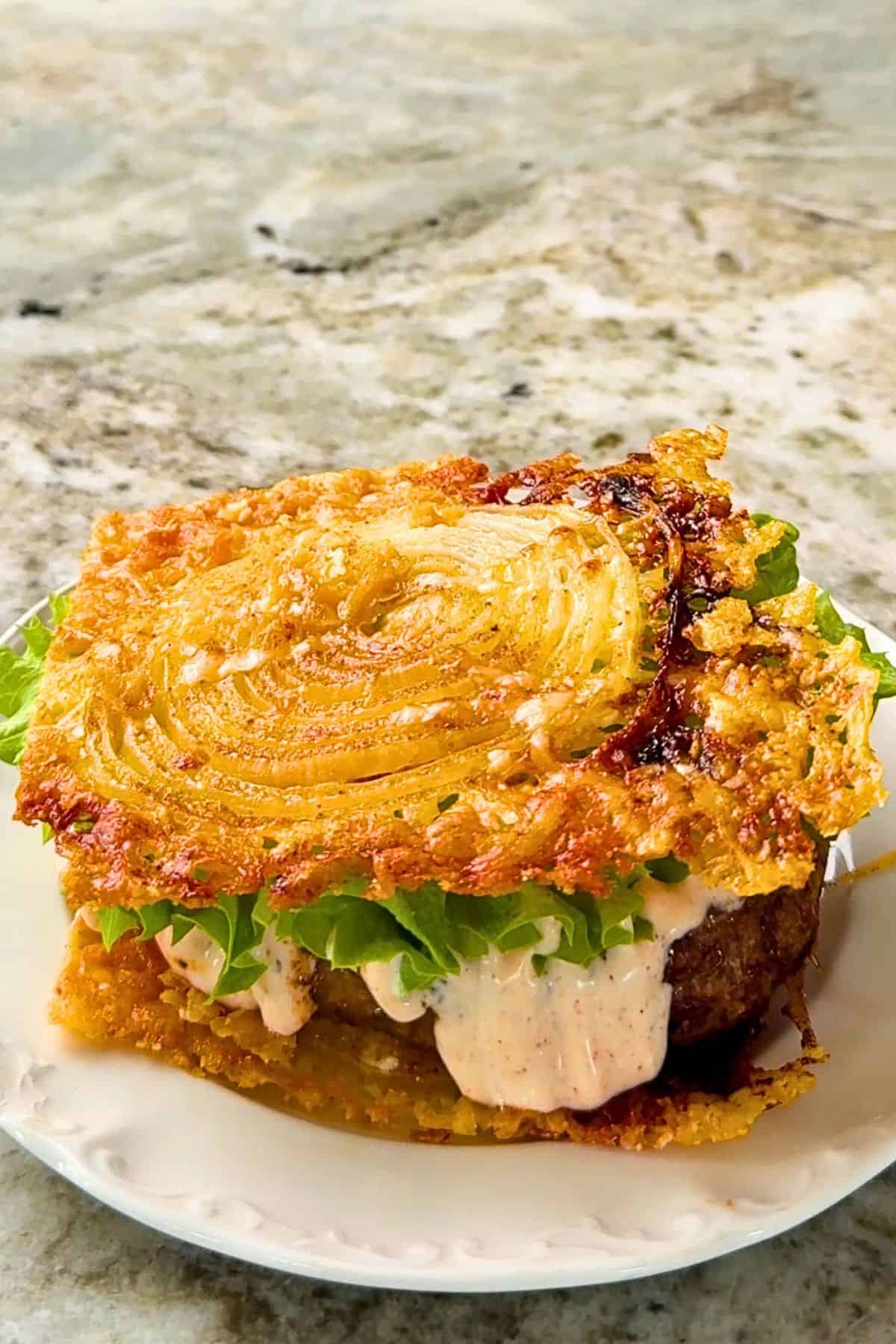 2 ingredient onion ring chips used as a hamburger bun.