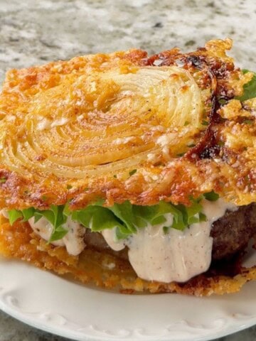 2 ingredient onion ring chips used as a bun for a hamburger.